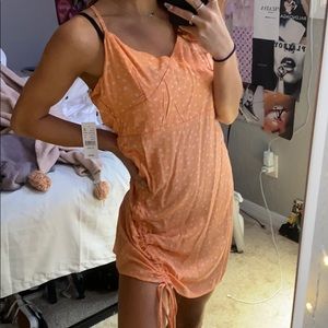 Never worn , orange floral dress , w tie string .